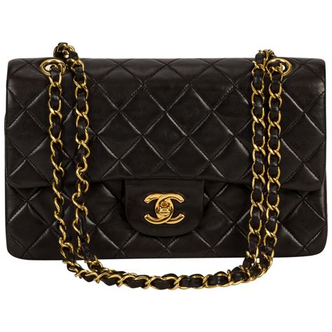 chanel black and gold handbag|black chanel bag gold chain.